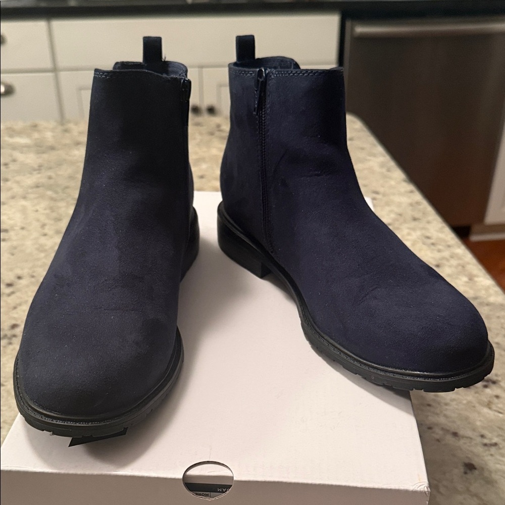 Like new Navy Blue suede boots. One inch heel. Size 8.5. Worn once